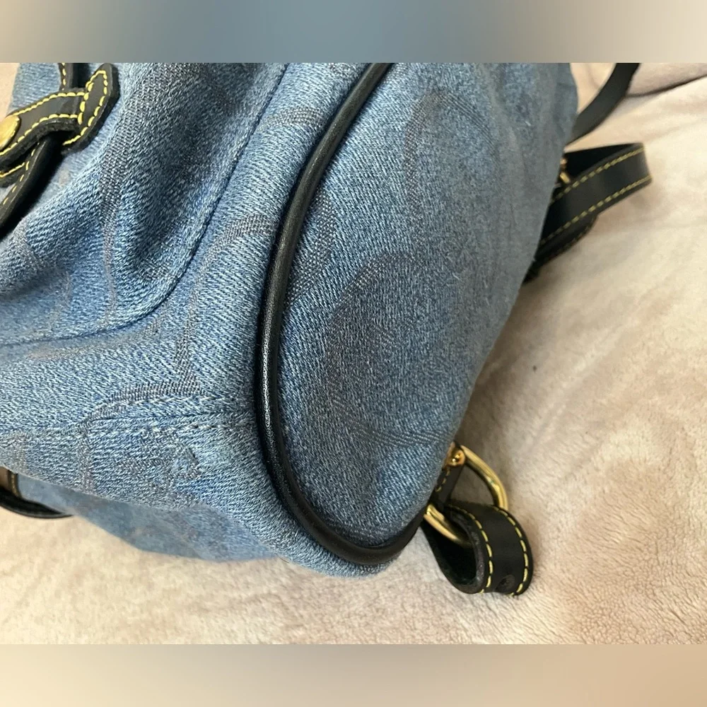 Dooney & Bourke Vintage Canyon Backpack in blue denim. 10.5”x 9.25”x 4”